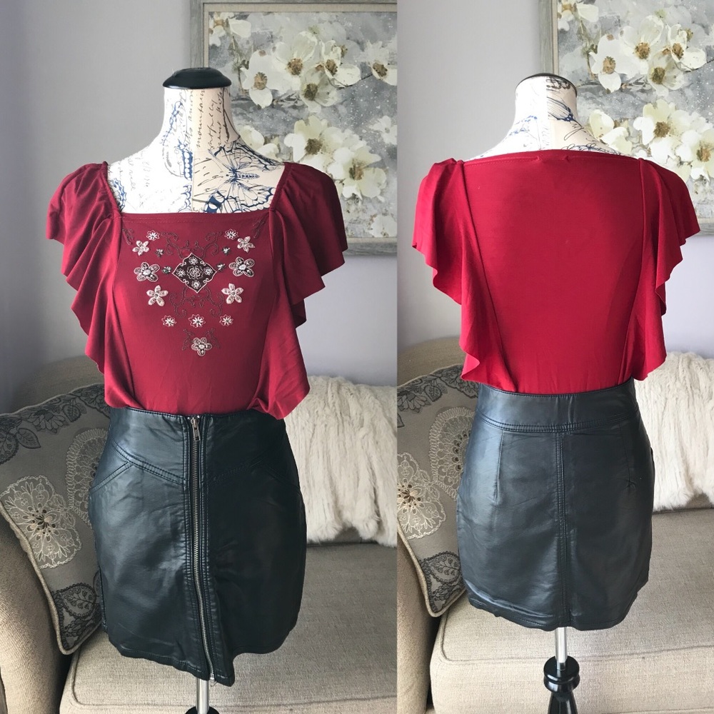 Maroon ruffle shirt with floral design